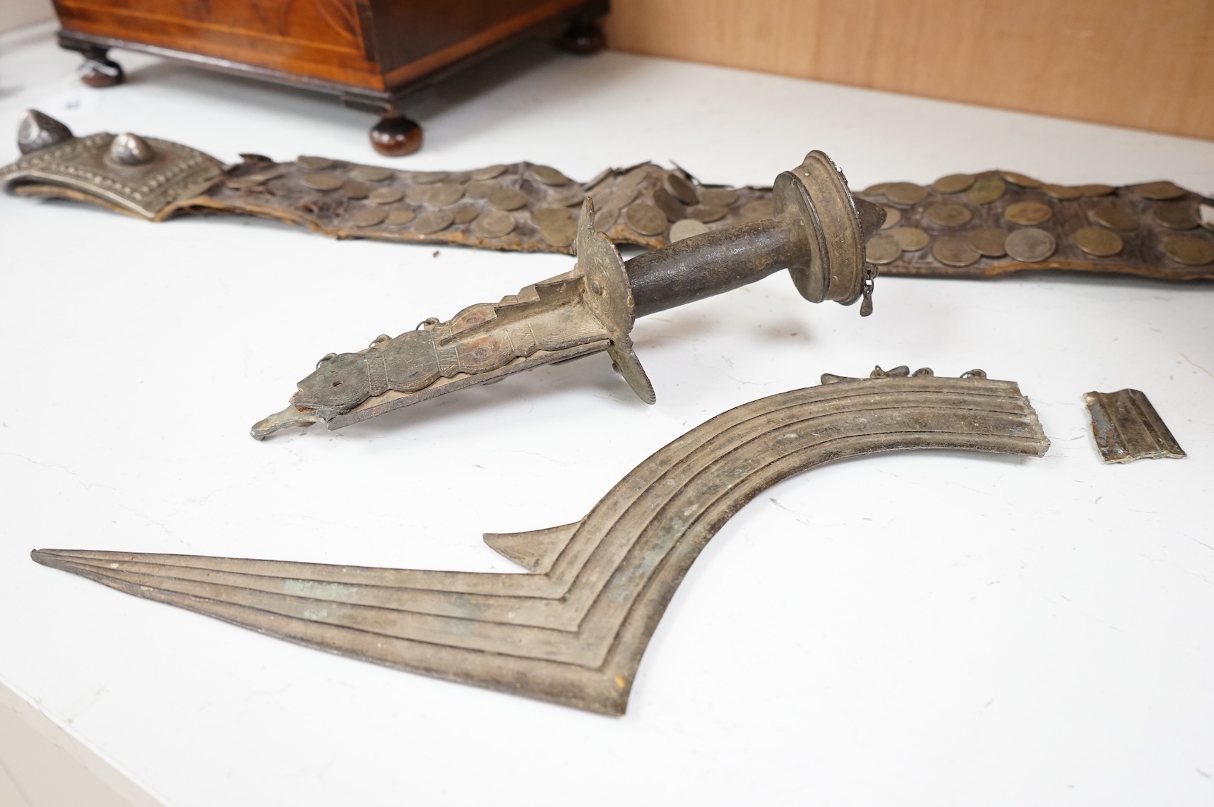 A 19th century Persian silver, niello work and coin mounted belt, dated 1880 (1297 AH in script) and an African sword (broken)
